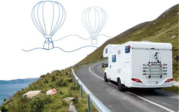 an RV on a road with doodles of hot air balloons above